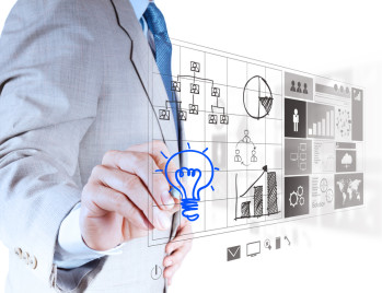Business man sketching ideas. Link to CDM portfolio delivery.