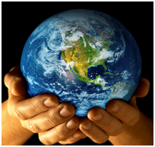 Image of the earth being held an individuals hands.